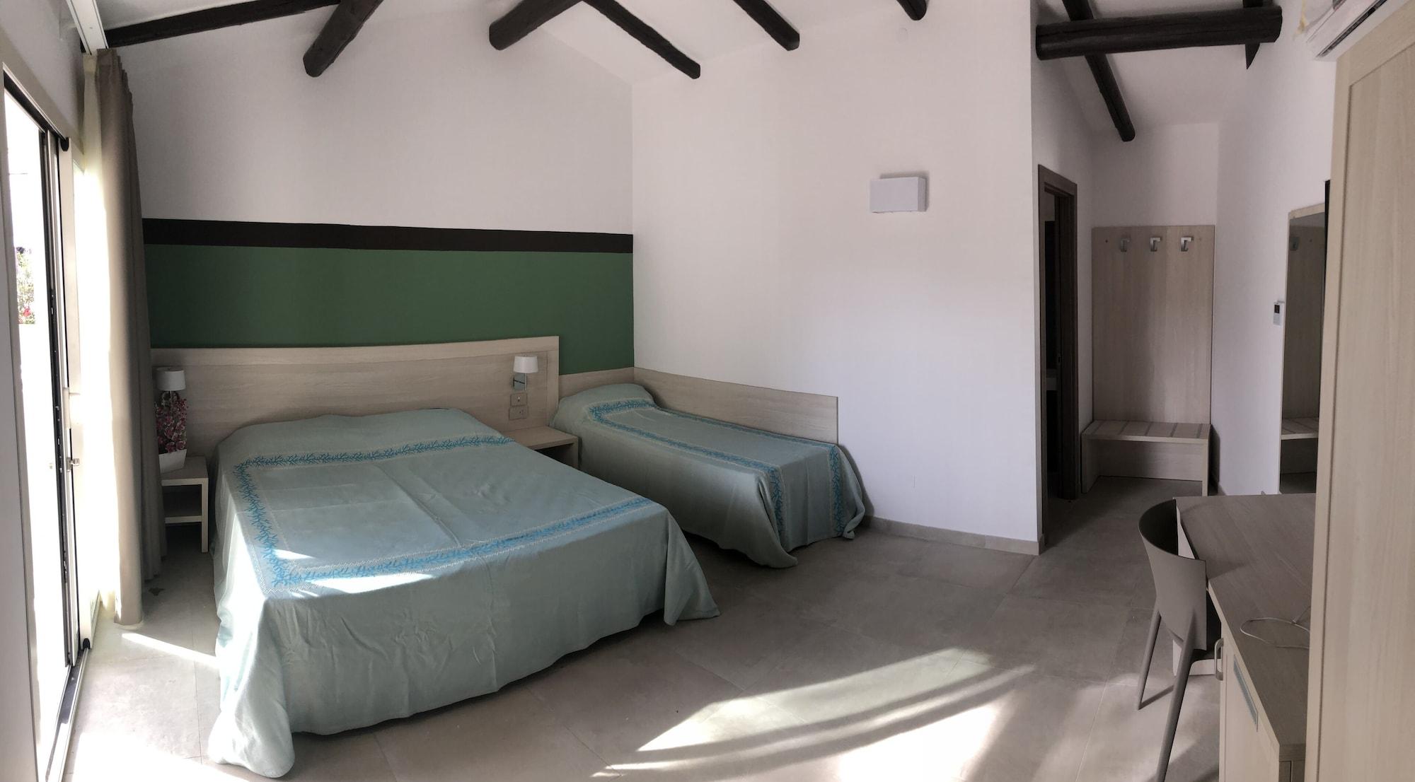 Hotel Club Esse Cala Bitta à Baja Sardinia Extérieur photo
