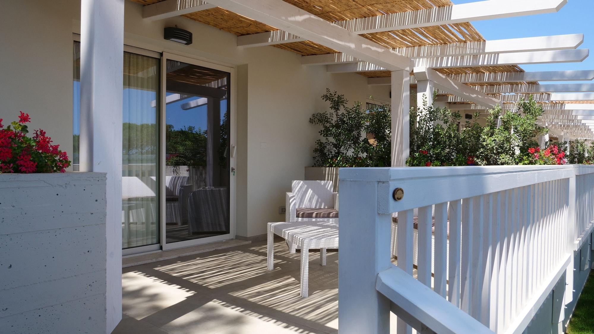 Hotel Club Esse Cala Bitta à Baja Sardinia Extérieur photo