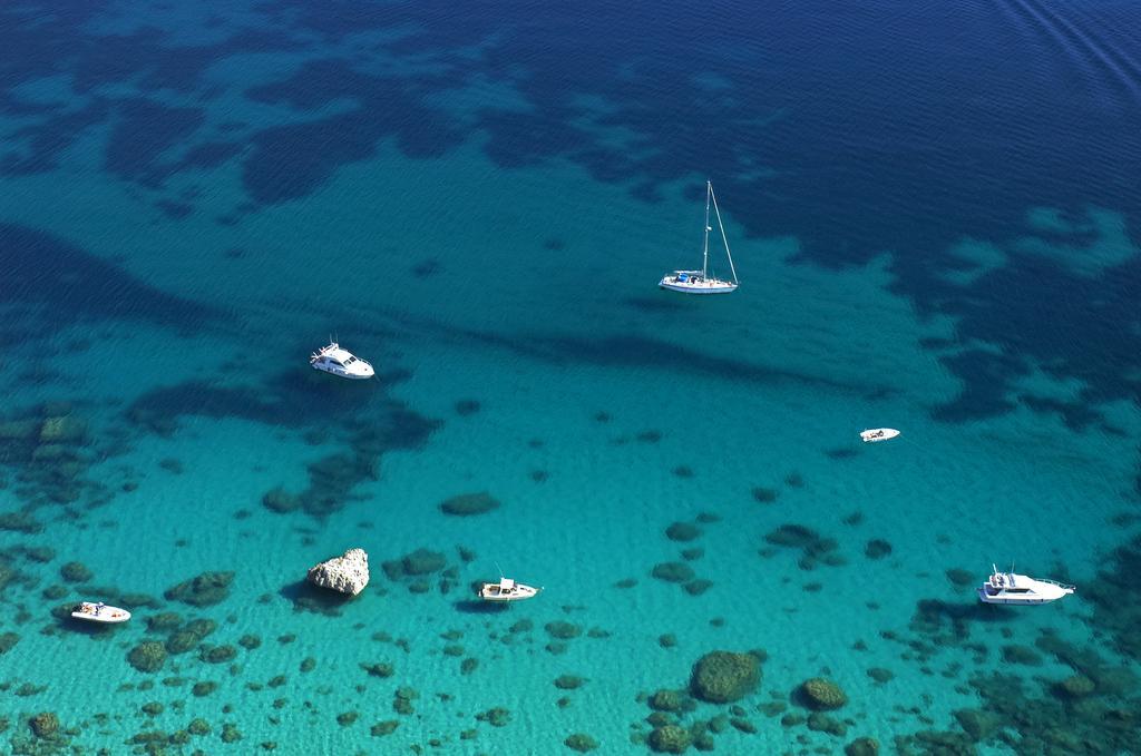 Hotel Club Esse Cala Bitta à Baja Sardinia Extérieur photo